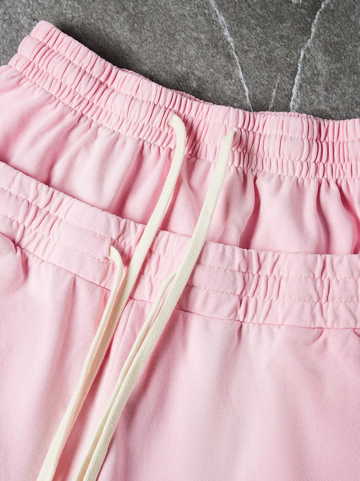 NOISSEY CHERRY BLOSSOM PINK WHITE CROSS CLUSTER GRAPHIC SHORTS