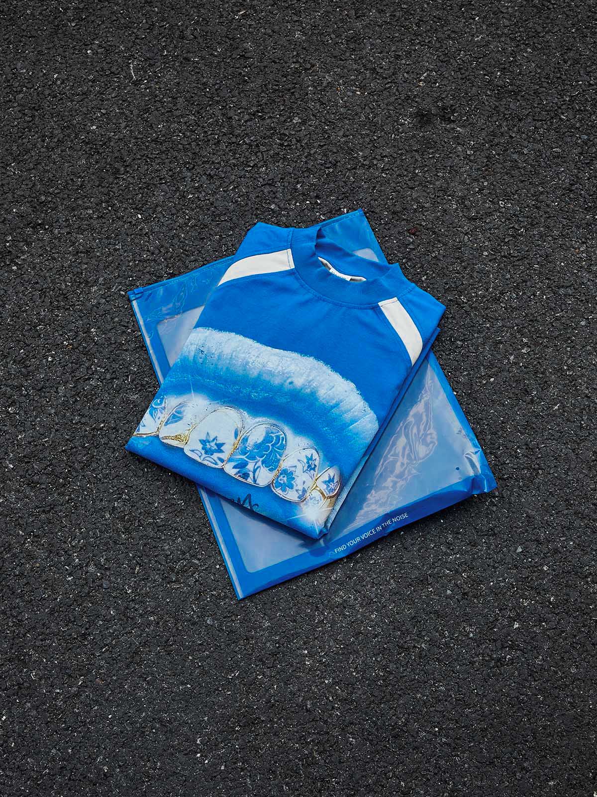 Cyanotype-style blue-and-white porcelain grillz shimmering art printed T-shirt