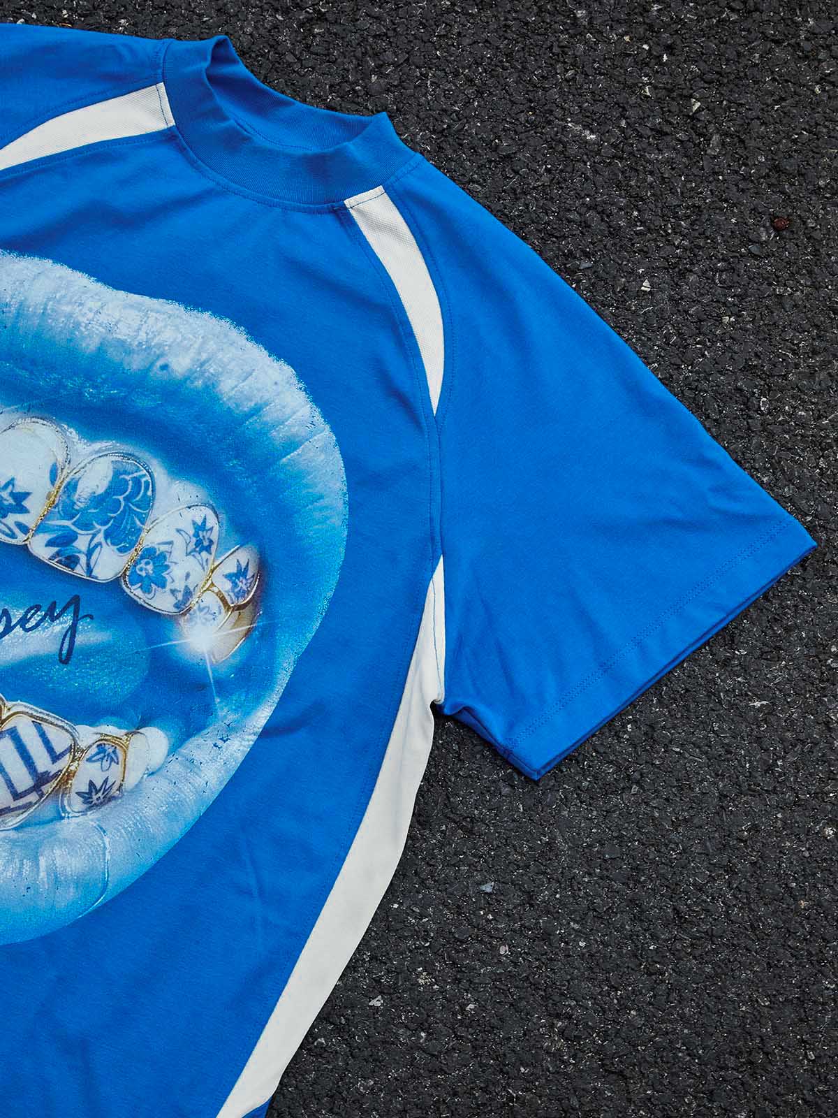 Cyanotype-style blue-and-white porcelain grillz shimmering art printed T-shirt