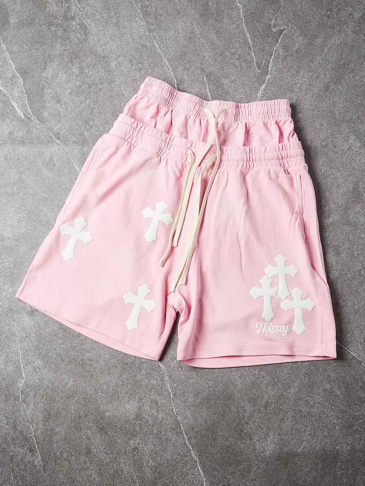NOISSEY CHERRY BLOSSOM PINK WHITE CROSS CLUSTER GRAPHIC SHORTS